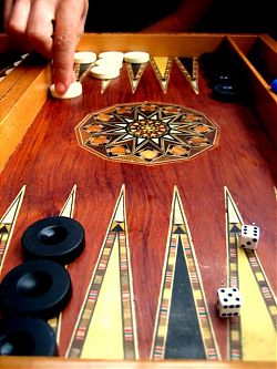 Learning Backgammon