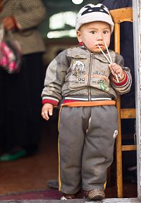 Uyghur Chinese Boy, Kashgar. Very typical. Click to englarge.
